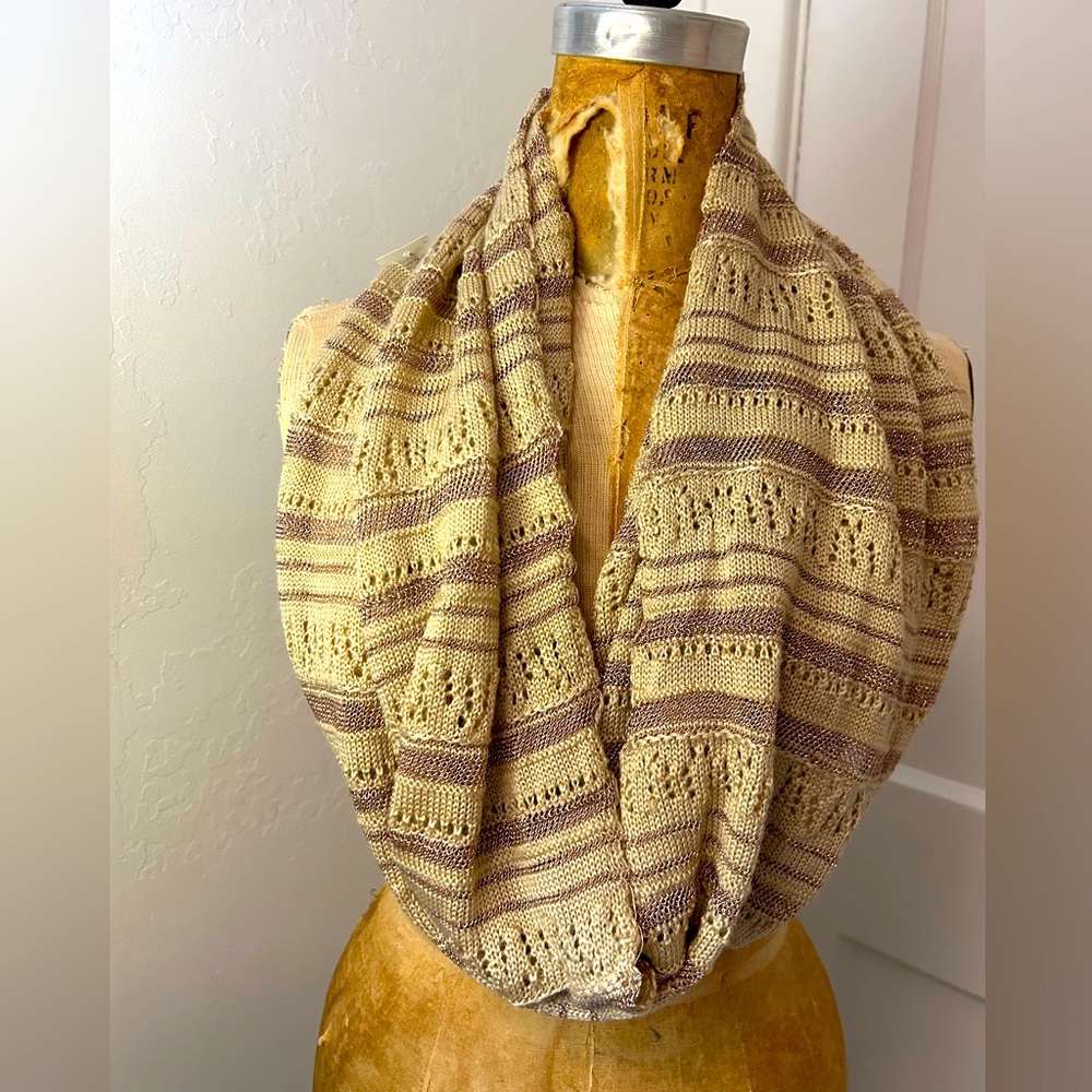 New, unworn pointelle deep beige infinity scarf with deep gold metallic accents.